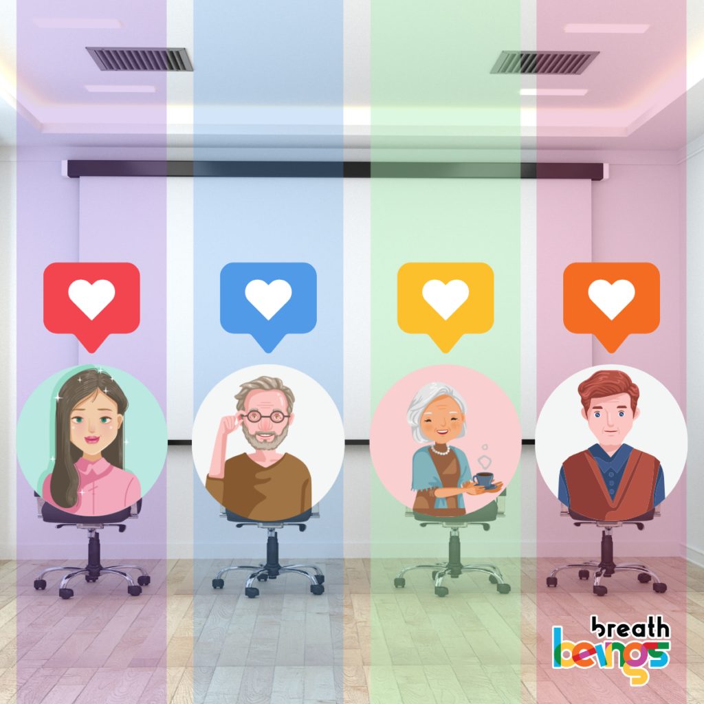 The image has a modern, well-lit room with wooden flooring and a white screen in the background. Four rolling office chairs are lined up in the center, each displaying a circular avatar of a cartoon person: a young woman, an older man with glasses, an elderly woman holding a cup, and a young man. Above each avatar is a colorful speech bubble with a heart icon (red, blue, yellow, orange).